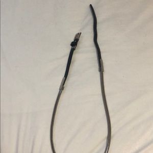 Black belt with silver bendable mental as accent